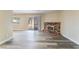 Inviting living room featuring a cozy fireplace and sliding glass doors to the backyard at 1356 Spague St, Henderson, NV 89011