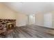 Bright living room with new flooring and a classic brick fireplace at 1356 Spague St, Henderson, NV 89011
