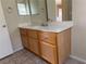 Bathroom features a wood vanity with drawers and cabinets at 1434 Summer Glow Ave, Henderson, NV 89012