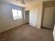 Bedroom featuring neutral carpet, a ceiling fan, and a closet providing storage space at 1434 Summer Glow Ave, Henderson, NV 89012