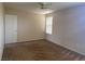 Comfortable bedroom with neutral walls, carpet and bright natural light through the window at 1434 Summer Glow Ave, Henderson, NV 89012