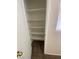 Hallway closet featuring multiple shelves for linen or general storage at 1434 Summer Glow Ave, Henderson, NV 89012