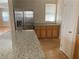 Bright kitchen with stainless steel appliances, countertops and cabinetry at 1434 Summer Glow Ave, Henderson, NV 89012