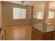 Open-concept living space featuring hardwood floors and ceiling fan at 1434 Summer Glow Ave, Henderson, NV 89012
