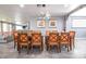Elegant dining room with a large table, comfortable chairs, and modern lighting fixture, ideal for gatherings at 1521 Sombrero Dr, Las Vegas, NV 89169