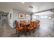 Spacious dining room area with modern decor and seating for a large Gathering at 1521 Sombrero Dr, Las Vegas, NV 89169