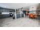 Open-concept kitchen featuring stainless steel appliances and modern cabinetry with a view into the dining and living space at 1521 Sombrero Dr, Las Vegas, NV 89169