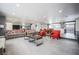 Expansive living space with tile floors, comfortable seating, and seamless transition to the dining area and kitchen at 1521 Sombrero Dr, Las Vegas, NV 89169