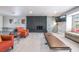 Spacious living room featuring a modern fireplace, gray walls, and neutral furniture, perfect for relaxation at 1521 Sombrero Dr, Las Vegas, NV 89169