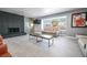 Comfortable living area with a modern fireplace and plenty of natural light at 1521 Sombrero Dr, Las Vegas, NV 89169