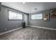 Bright room with gray walls, neutral flooring, and abundant natural light through the window at 1521 Sombrero Dr, Las Vegas, NV 89169