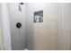 Updated shower with modern tile, built-in niche, and sleek fixtures at 1521 Sombrero Dr, Las Vegas, NV 89169