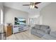 Bright living room with modern decor, wood-look flooring, and comfortable seating at 1622 Lorna Dr, Henderson, NV 89011