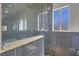 Sleek remodeled shower with tiled walls and glass door at 1622 Lorna Dr, Henderson, NV 89011