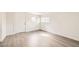 Bright bedroom features updated flooring, a new door, and plenty of natural light at 1829 E Saint Louis Ave, Las Vegas, NV 89104