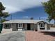 Charming single-story home featuring updated windows, fresh paint, and low maintenance landscaping at 1829 E Saint Louis Ave, Las Vegas, NV 89104