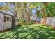 A backyard features artificial turf, a putting green, and a storage shed at 1931 Pago Ct, Las Vegas, NV 89117