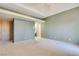 Spacious bedroom featuring neutral walls, carpet, and built-in wardrobe at 1931 Pago Ct, Las Vegas, NV 89117