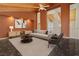 Inviting living room featuring high ceilings, modern decor, and cozy seating at 1931 Pago Ct, Las Vegas, NV 89117