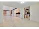 Open living space showcasing tile floors and adjacent kitchen and dining areas at 1931 Pago Ct, Las Vegas, NV 89117