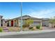 Attractive single-story home boasting desert landscaping, brick driveway, and a two-car garage at 2238 Thelen Ave, North Las Vegas, NV 89086