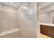 Beautiful tile shower features a comfortable bench and stylish design at 2238 Thelen Ave, North Las Vegas, NV 89086