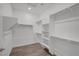 Walk-in closet with custom shelving and ample storage space at 2238 Thelen Ave, North Las Vegas, NV 89086