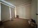 Bedroom with paneled walls and carpet at 2300 Pardee Pl, Las Vegas, NV 89104