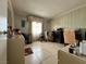 Spacious bedroom with a bright window, ample space and vintage decor at 2300 Pardee Pl, Las Vegas, NV 89104