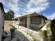 Exterior view of home featuring covered patio at 2300 Pardee Pl, Las Vegas, NV 89104