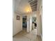 Hallway view showcasing access to bedroom and bathroom with tiled floors at 2300 Pardee Pl, Las Vegas, NV 89104