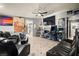 Open-concept living room with tile flooring and a view of an adjacent room at 251 Las Palmaritas Dr, Las Vegas, NV 89110