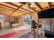 Covered patio with a pool table, seating area, and a view of the pool at 251 Las Palmaritas Dr, Las Vegas, NV 89110
