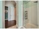 Bathroom with glass enclosed shower, wood floors, and neutral walls at 280 Goldstar St, Henderson, NV 89012