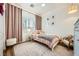 Stylish room features a plush rug and a pink color scheme at 280 Goldstar St, Henderson, NV 89012