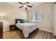Bright bedroom with hardwood floors and a ceiling fan at 280 Goldstar St, Henderson, NV 89012