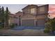 Beautiful two-story home featuring a well maintained landscaped front yard with a spacious two car garage at 280 Goldstar St, Henderson, NV 89012