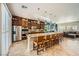Spacious kitchen with a large center island, stainless steel appliances, and a breakfast bar at 280 Goldstar St, Henderson, NV 89012