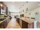 Spacious kitchen features granite countertops, dark cabinets, and stainless steel appliances at 280 Goldstar St, Henderson, NV 89012