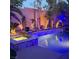 Backyard pool featuring a hot tub, stone accents, and decorative lighting on the palm trees at 280 Goldstar St, Henderson, NV 89012