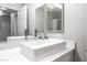 Bathroom features white vessel sink and vanity, large mirror, with view of second mirror at 2851 S Valley View Blvd # 1044, Las Vegas, NV 89102