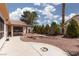 A well maintained backyard featuring stone landscaping and providing a serene outdoor living space at 3522 Shonna Way, North Las Vegas, NV 89032