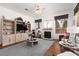 Bright living room featuring hardwood floors, built-in shelving, and a cozy fireplace creating a warm gathering space at 3522 Shonna Way, North Las Vegas, NV 89032