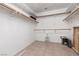 Walk-in closet with multiple shelves and wooden rods for organizing clothes at 3522 Shonna Way, North Las Vegas, NV 89032
