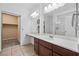 Bathroom featuring a closet, large counter, vanity and shower at 358 Whispering Tree Ave, Las Vegas, NV 89183