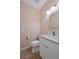 Powder room featuring a modern vanity, tile floors, toilet, and neutral paint at 358 Whispering Tree Ave, Las Vegas, NV 89183