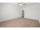 Large bedroom featuring neutral paint, carpet flooring, and a ceiling fan at 358 Whispering Tree Ave, Las Vegas, NV 89183