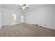 Spacious bedroom with neutral colored carpet and ample space at 358 Whispering Tree Ave, Las Vegas, NV 89183
