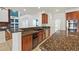 Updated kitchen features granite counters, stainless appliances and plenty of cabinet space at 358 Whispering Tree Ave, Las Vegas, NV 89183