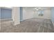 Open floor plan featuring neutral tones, plush carpets, and ample natural light at 358 Whispering Tree Ave, Las Vegas, NV 89183